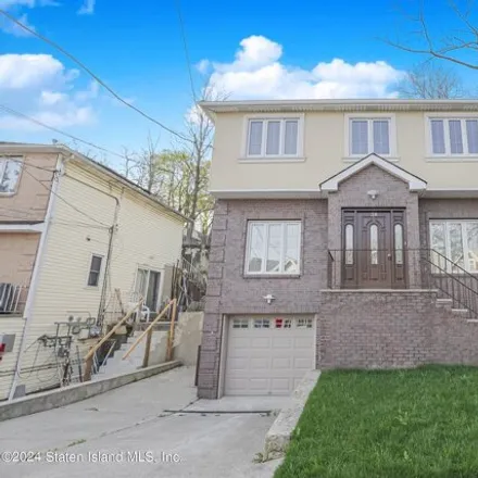 Buy this 3 bed house on 38 Edgar Terrace in New York, NY 10301