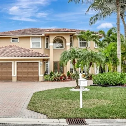 Buy this 5 bed house on 12389 Northwest 50th Place in Coral Springs, FL 33076
