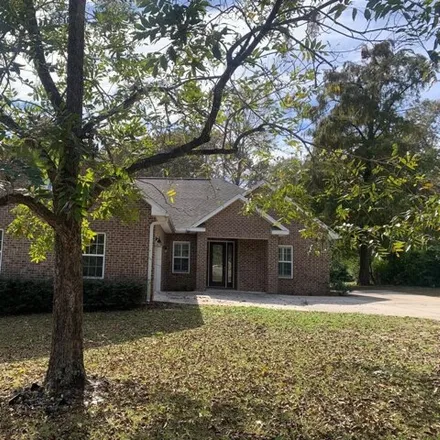 Rent this 4 bed house on 3076 Airport Road in Okaloosa County, FL 32539