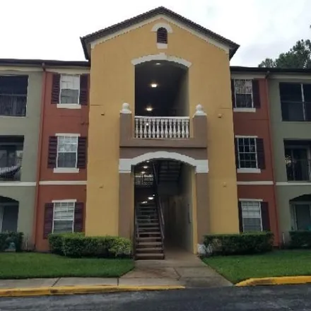 Buy this 2 bed condo on 12699 Courtney Lake Drive in Orange County, FL 32828