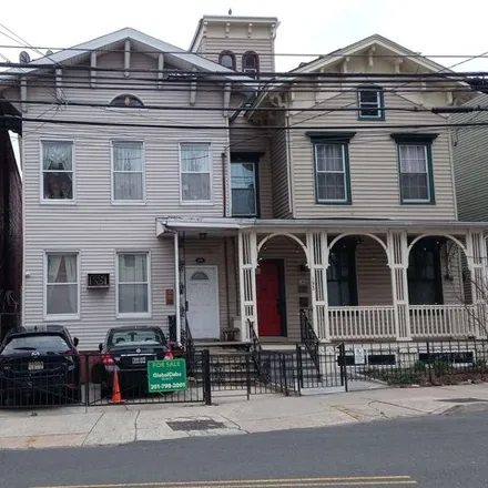 Buy this 4 bed house on 2 Howard Place in Jersey City, NJ 07306