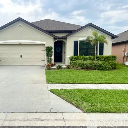 Rent this 4 bed house on 4717 Magenta Isles Drive