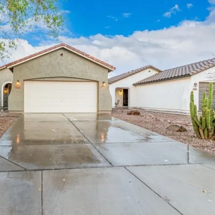 Buy this 3 bed house on 36516 West Mallorca Avenue in Maricopa, AZ 85138