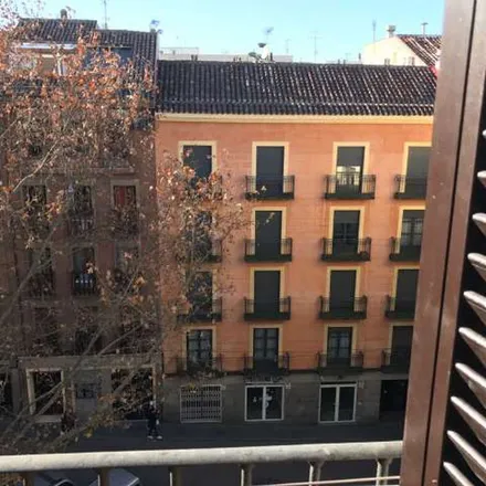 Rent this 9 bed apartment on Madrid in El Cogollo de la Descarga, Calle de las Hileras