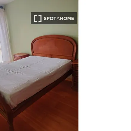Rent this 3 bed room on Rua Fernando Maurício 30 in 1950-449 Lisbon, Portugal