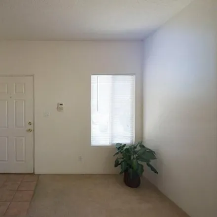 Rent this 4 bed house on 8901 Loch Side Lane Northeast in Albuquerque, NM 87113