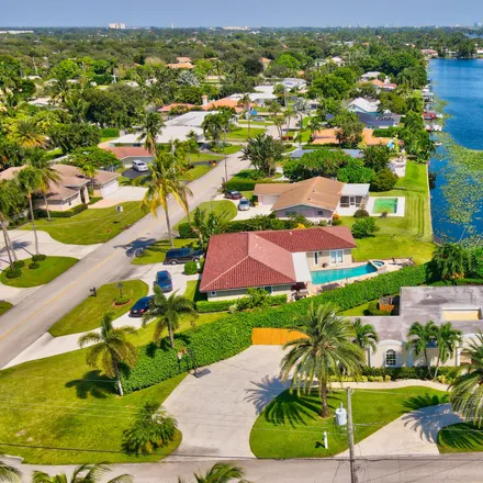 Buy this 4 bed house on Mediterranean Road in Lake Clarke Shores, Palm Beach County
