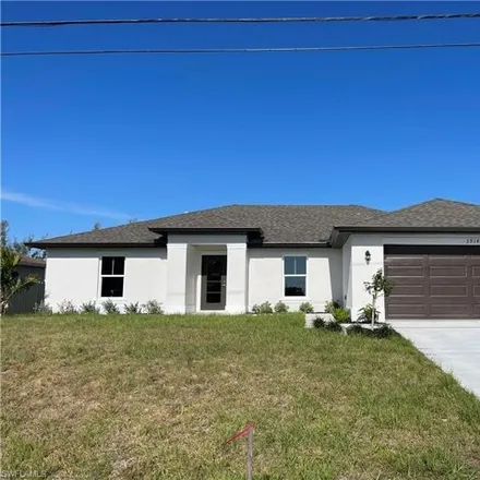 Rent this 4 bed house on Northeast 10th Place in Cape Coral, FL
