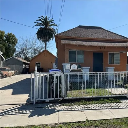 Rent this 4 bed house on 1261 West Rialto Avenue in San Bernardino, CA 92410