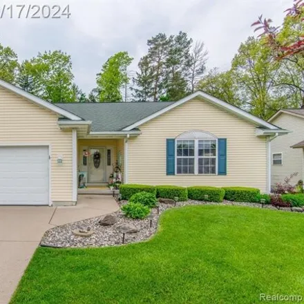 Buy this 3 bed house on 11313 Autumn Breeze Trail in Vienna Charter Township, MI 48420