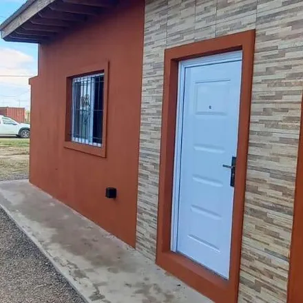 Buy this studio house on Alfredo Schilla Oeste in Departamento Rosario, Ibarlucea