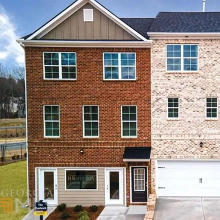 Buy this 4 bed townhouse on 4599 Dahlia Drive in Pine Lake, DeKalb County