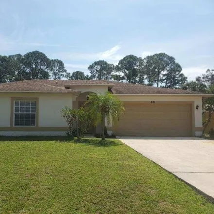 Rent this 3 bed house on 621 Northwest Selvitz Road in Port Saint Lucie, FL 34983