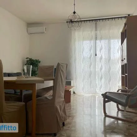 Rent this 3 bed apartment on Via Parmigianino in 20146 Milan MI, Italy