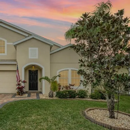 Buy this 4 bed house on 3726 Aria Drive in Melbourne, FL 32904