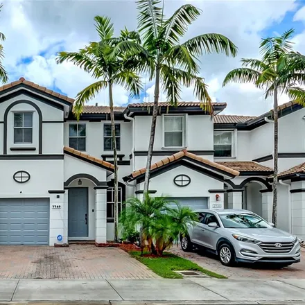 Buy this 4 bed townhouse on 7749 Northwest 116th Path in Medley, Doral