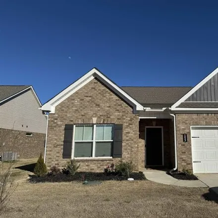 Rent this 3 bed house on Morning Dew Road in Gardens at Ivy Hills, Madison County