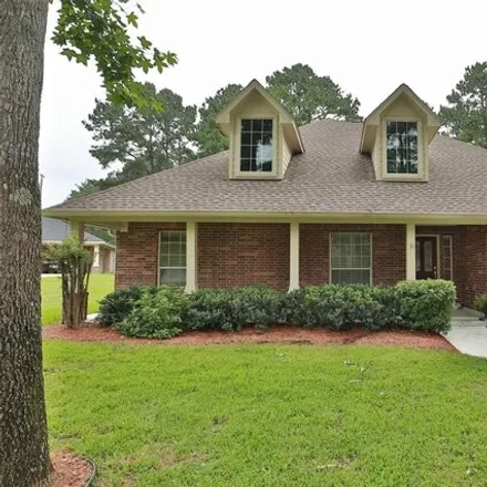Buy this 3 bed house on 12588 Mustang Court in Montgomery County, TX 77354