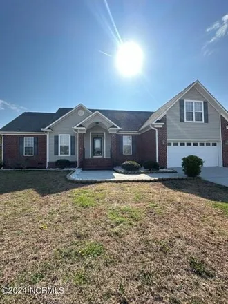 Rent this 4 bed house on 343 Windham Lane in Jacksonville, NC 28540