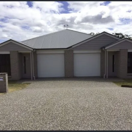 Rent this 3 bed duplex on Sanctuary Drive in Cranley QLD, Australia