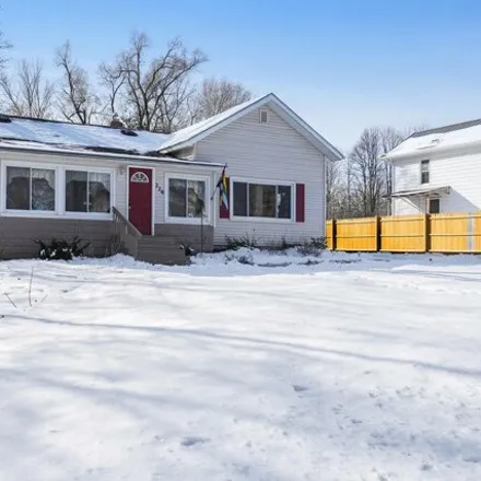 Buy this 2 bed house on West Division Street Northeast in Rockford, MI 49341