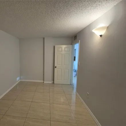 Rent this 1 bed condo on 6990 Nw 186th St Apt 4-411 in Hialeah, Florida