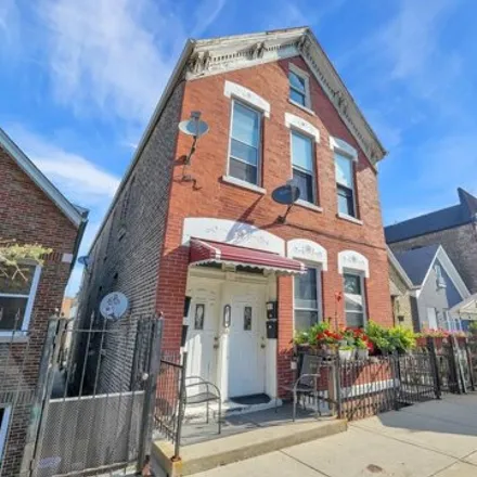 Buy this 8 bed house on 2120 W 23rd Pl in Chicago, Illinois