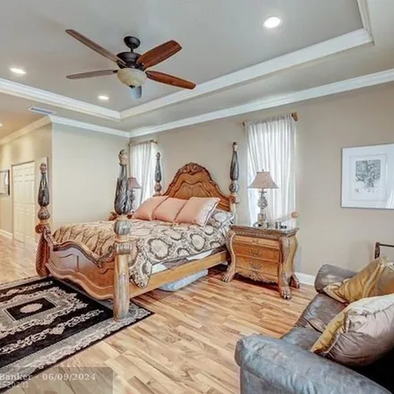 Rent this 5 bed apartment on 7662 Northwest 127th Manor in Parkland, FL 33076