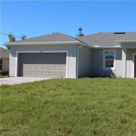 Buy this 3 bed house on Coral Oaks Golf Course in 1800 Northwest 28th Avenue, Cape Coral