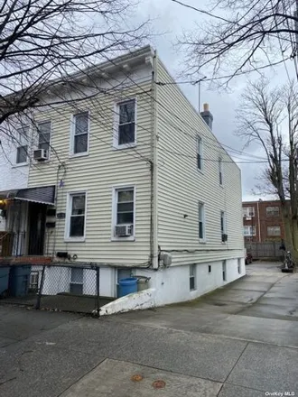Buy this 5 bed house on 81-39 102nd Avenue in New York, NY 11416