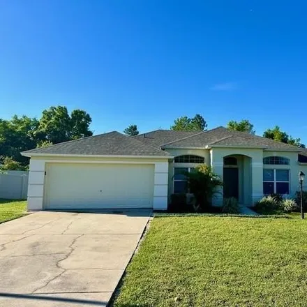 Rent this 3 bed house on 605 Red Mulberry Drive in Deltona, FL 32725