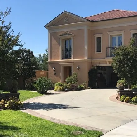 Rent this 4 bed house on 51 Domani in Irvine, California