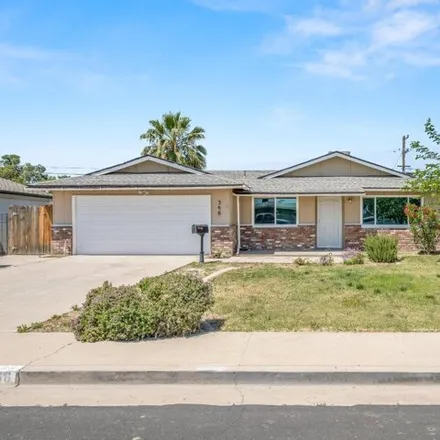 Buy this 4 bed house on 358 West Spruce Avenue in Lemoore, CA 93245
