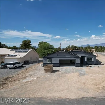 Buy this 4 bed house on 1590 Blackhorn Street in Pahrump, NV 89048