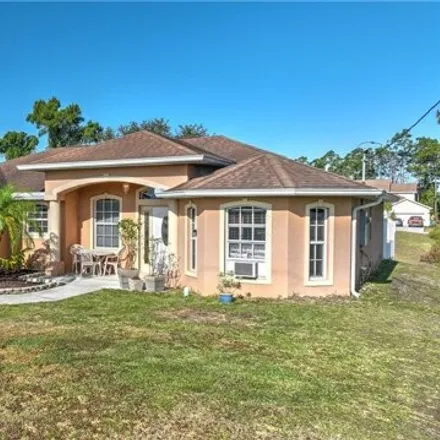 Buy this 3 bed house on 398 Charwood Avenue South in Lehigh Acres, FL 33974