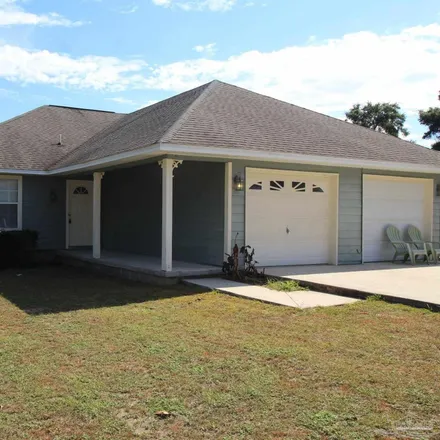 Rent this 2 bed townhouse on 4398 Melton Road in Bagdad, Santa Rosa County