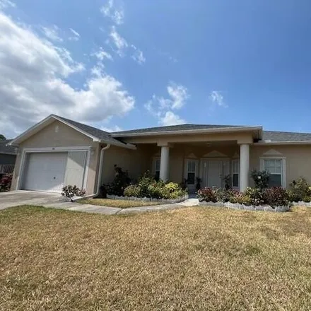 Rent this 4 bed house on 339 Americana Boulevard Northeast in Palm Bay, FL 32907