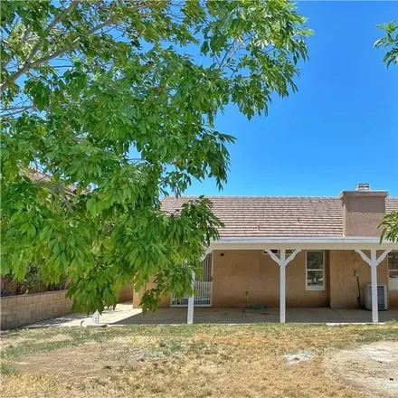 Rent this 3 bed house on 36816 Firethorn Avenue in Palmdale, CA 93550