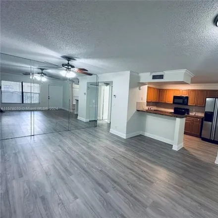 Rent this 2 bed condo on 5537 Courtyard Drive in Margate, FL 33063