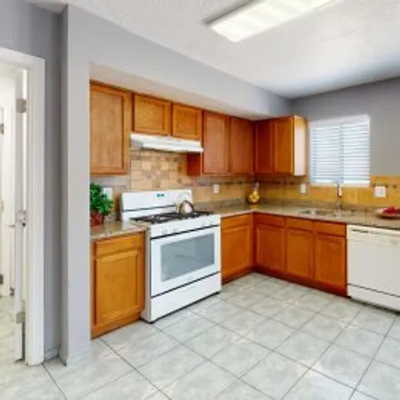 Buy this 4 bed apartment on 7004 Poppy Place Northwest in Los Volcanes, Albuquerque