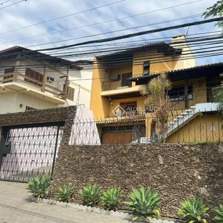 Buy this 3 bed house on Wainui in Rua Eloy Koch, Cristo Rei