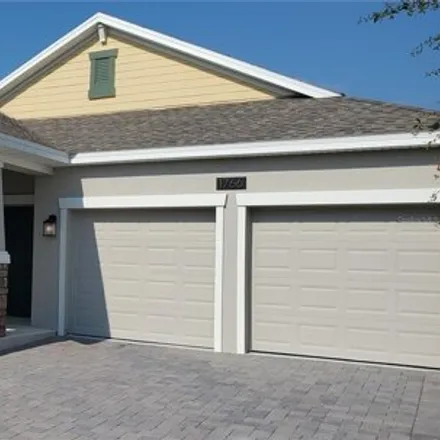 Rent this 4 bed house on 1766 Grateful Ln in Kissimmee, Florida