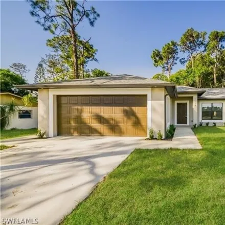 Buy this 4 bed house on 8091 Harrisburg Drive in San Carlos Park, FL 33967