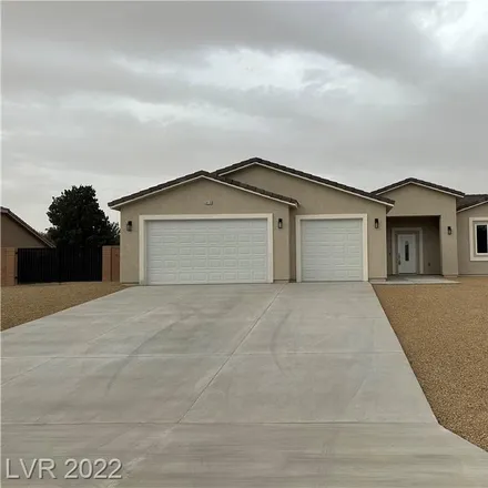 Buy this 3 bed house on 5299 Fieldstone Drive in Pahrump, NV 89061
