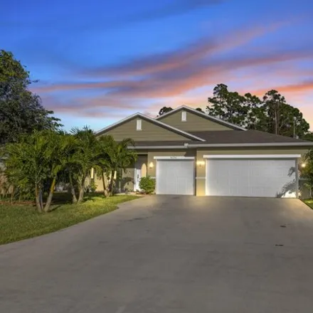 Buy this 4 bed house on 4324 Southwest Calah Circle in Port Saint Lucie, FL 34953