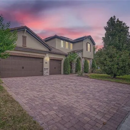 Buy this 7 bed house on 8540 Geddes Loop in Doctor Phillips, FL 32836