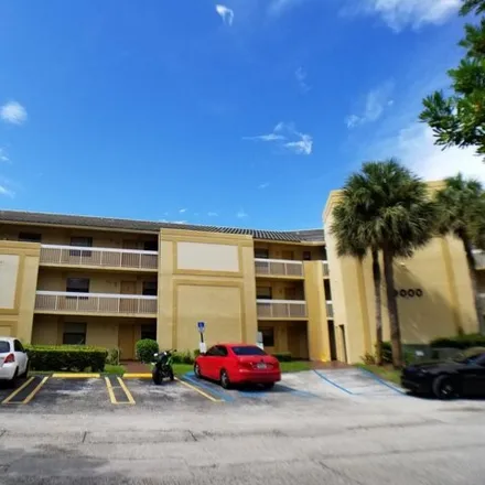 Rent this 2 bed condo on Northwest 28th Drive in Coral Springs, FL 33065