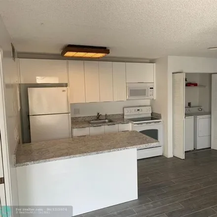 Rent this 1 bed condo on 645 Executive Center Dr Unit R202 in West Palm Beach, Florida