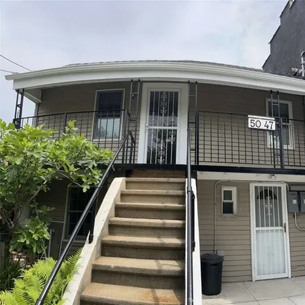 Rent this 3 bed house on 50-47 67th Street in New York, NY 11377