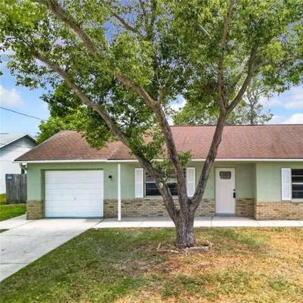Buy this 2 bed house on 3282 Dolin Avenue in Spring Hill, FL 34606
